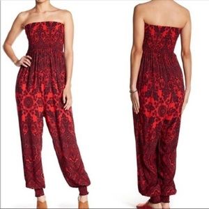 Free people strapless romper, size Medium. Very flattering fit, stretchy top.